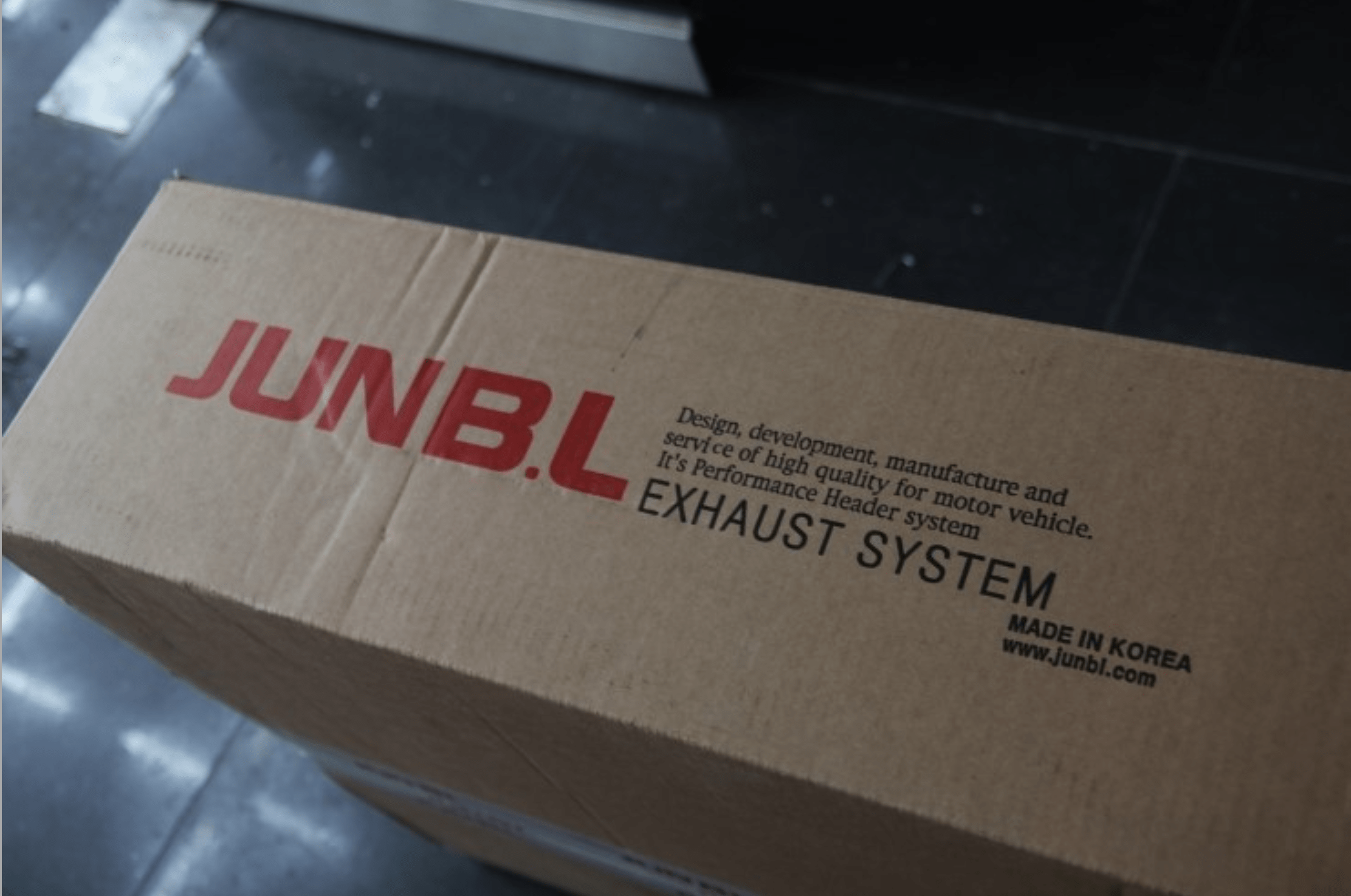 JUN B.L logo box